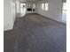 Spacious living room featuring a fireplace and large windows for natural light at 15983 E Loyola Dr, Aurora, CO 80013