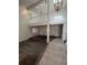 Open-concept living room with a loft area and neutral-toned carpet and tile flooring at 15983 E Loyola Dr, Aurora, CO 80013