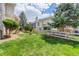 Spacious backyard with green grass and wood fence at 19058 E Hickock Dr, Parker, CO 80134