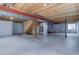 Unfinished basement with exposed beams, concrete floor, and window at 19058 E Hickock Dr, Parker, CO 80134