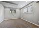 Finished basement featuring plush carpet, recessed lighting, and windows providing natural light at 2041 W Briarwood Ave, Littleton, CO 80120