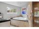 Bathroom features an oversized soaking tub with jets and a window at 2041 W Briarwood Ave, Littleton, CO 80120