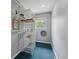Walk-in closet with shelving and window at 2041 W Briarwood Ave, Littleton, CO 80120