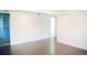 A bright, open living room area with neutral walls, closet, and lots of space at 7270 S Cherry Dr, Centennial, CO 80122