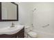 Bathroom with tub, toilet and vanity at 8199 Welby Rd # 2304, Denver, CO 80229
