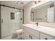 Beautiful bathroom featuring a glass enclosed shower and modern vanity with ample storage at 14890 W 58Th Pl, Golden, CO 80403