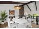 Bright dining room area with modern lighting fixture and easy access to the home's living spaces at 14890 W 58Th Pl, Golden, CO 80403