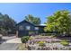 Well-maintained two-story home boasts mature landscaping and a large driveway at 14890 W 58Th Pl, Golden, CO 80403