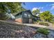 A two-story home with a garage, tasteful landscaping, and hardscape at 14890 W 58Th Pl, Golden, CO 80403