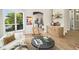 Stylish living room with a modern design, hardwood floors, and natural light at 14890 W 58Th Pl, Golden, CO 80403