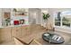 Inviting living room with hardwood floors, bar, and modern decor at 14890 W 58Th Pl, Golden, CO 80403