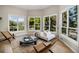 Bright living room boasting large windows and modern furnishings at 14890 W 58Th Pl, Golden, CO 80403