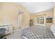 Bright bedroom featuring a large window, desk, and neutral tones at 17165 Colonial Park Dr, Monument, CO 80132