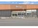 Exterior front view of Clark's Market, displaying its contemporary architecture and inviting entrance along a city street at 373 S Locust St, Denver, CO 80224