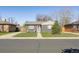 Charming single Gathering home featuring a tidy front yard and a freshly painted gray brick facade at 373 S Locust St, Denver, CO 80224