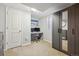Well-lit office space with a modern wardrobe cabinet and white walls at 373 S Locust St, Denver, CO 80224