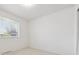 Bright bedroom with natural light, neutral walls, and plush carpet at 200 Perry St, Denver, CO 80219