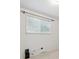 Clean bedroom with window and simple fixtures at 200 Perry St, Denver, CO 80219