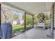 Covered patio offers a great view of the landscaped backyard, perfect for outdoor relaxation at 200 Perry St, Denver, CO 80219
