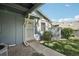 Welcoming front entrance with a 'welcome' mat and well-maintained landscaping at 12115 Bannock St # B, Denver, CO 80234