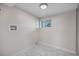 Laundry room with new tile flooring, connections, and a window at 6103 Uno St, Arvada, CO 80003