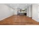 Bright living room features beautiful hardwood floors and plenty of natural light at 6103 Uno St, Arvada, CO 80003