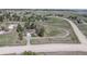 Aerial view of house with large lot and horse track; home features inviting driveway and scenic surroundings at 2781 Savage Rd, Elizabeth, CO 80107
