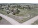 Stunning aerial view of property showcasing spacious lot with mature trees and convenient circular driveway at 2781 Savage Rd, Elizabeth, CO 80107