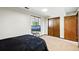 Comfortable bedroom with a large closet, natural light, and a neutral color scheme for a peaceful atmosphere at 2781 Savage Rd, Elizabeth, CO 80107