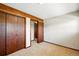 Bedroom featuring closet space, neutral paint, and easy access to other rooms in the home at 2781 Savage Rd, Elizabeth, CO 80107