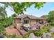 Backyard deck with outdoor seating and mountain views, perfect for entertaining at 276 Ember Pl, Castle Rock, CO 80104