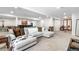 Spacious finished basement featuring a large sectional sofa and entertainment area at 276 Ember Pl, Castle Rock, CO 80104