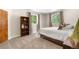 Cozy bedroom features a queen-sized bed, carpeted floor, and bright windows at 276 Ember Pl, Castle Rock, CO 80104
