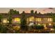 Charming exterior of a home featuring stone accents and a lush, professionally landscaped front yard at 276 Ember Pl, Castle Rock, CO 80104