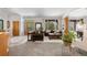 Inviting living room featuring a cozy seating area and a view of the front entrance at 276 Ember Pl, Castle Rock, CO 80104