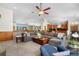 Spacious living room featuring an open layout, a comfortable sectional sofa, and bright natural light at 276 Ember Pl, Castle Rock, CO 80104