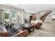 Inviting living room with a cozy seating area and a staircase at 276 Ember Pl, Castle Rock, CO 80104