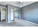 Bedroom with neutral walls, natural light, ceiling fan and carpeted flooring at 3351 S Field St # 164, Lakewood, CO 80227