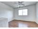 Bedroom with neutral walls, natural light, ceiling fan and hardwood flooring at 3351 S Field St # 164, Lakewood, CO 80227