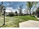 Exterior shot of building with grassy area and decorative lighting at 3351 S Field St # 164, Lakewood, CO 80227