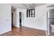 Bright living space shows wood floors and ceiling fan and adjoins the kitchen and dining areas at 3351 S Field St # 164, Lakewood, CO 80227