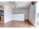 This living room offers wood floors, a ceiling fan and easy access to the outdoor deck at 3351 S Field St # 164, Lakewood, CO 80227