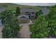 Charming two-story home with attached garage, landscaped yard, and mountain views at 828 Lehigh Cir, Erie, CO 80516