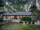 Charming single-story home with lush landscaping, manicured lawn and a welcoming front entrance at 2635 S Lamar Way, Lakewood, CO 80227