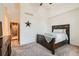 Spacious bedroom with carpet flooring, star decoration, and en-suite access at 149 Jewel St, Brighton, CO 80603
