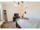 Comfortable bedroom featuring neutral colors and a ceiling fan for added convenience at 149 Jewel St, Brighton, CO 80603