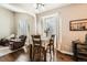 Bright dining room with modern lighting and comfortable seating at 149 Jewel St, Brighton, CO 80603