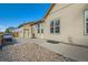 Charming home exterior featuring neutral siding, well-maintained landscaping, and a concrete patio at 149 Jewel St, Brighton, CO 80603