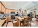 Well-appointed kitchen featuring stainless steel appliances and an island with bar seating at 149 Jewel St, Brighton, CO 80603