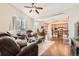 Spacious living room with an open layout, hardwood floors, and vaulted ceilings at 149 Jewel St, Brighton, CO 80603